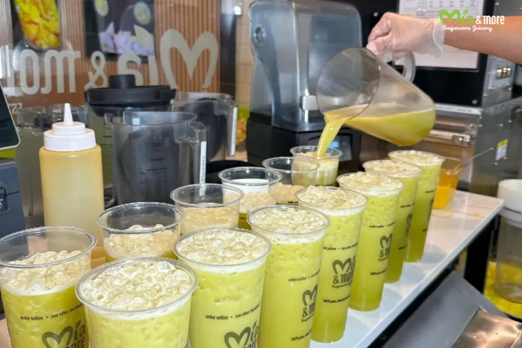 Pure sugarcane juice at Mía & More is pressed and poured right at the counter.
